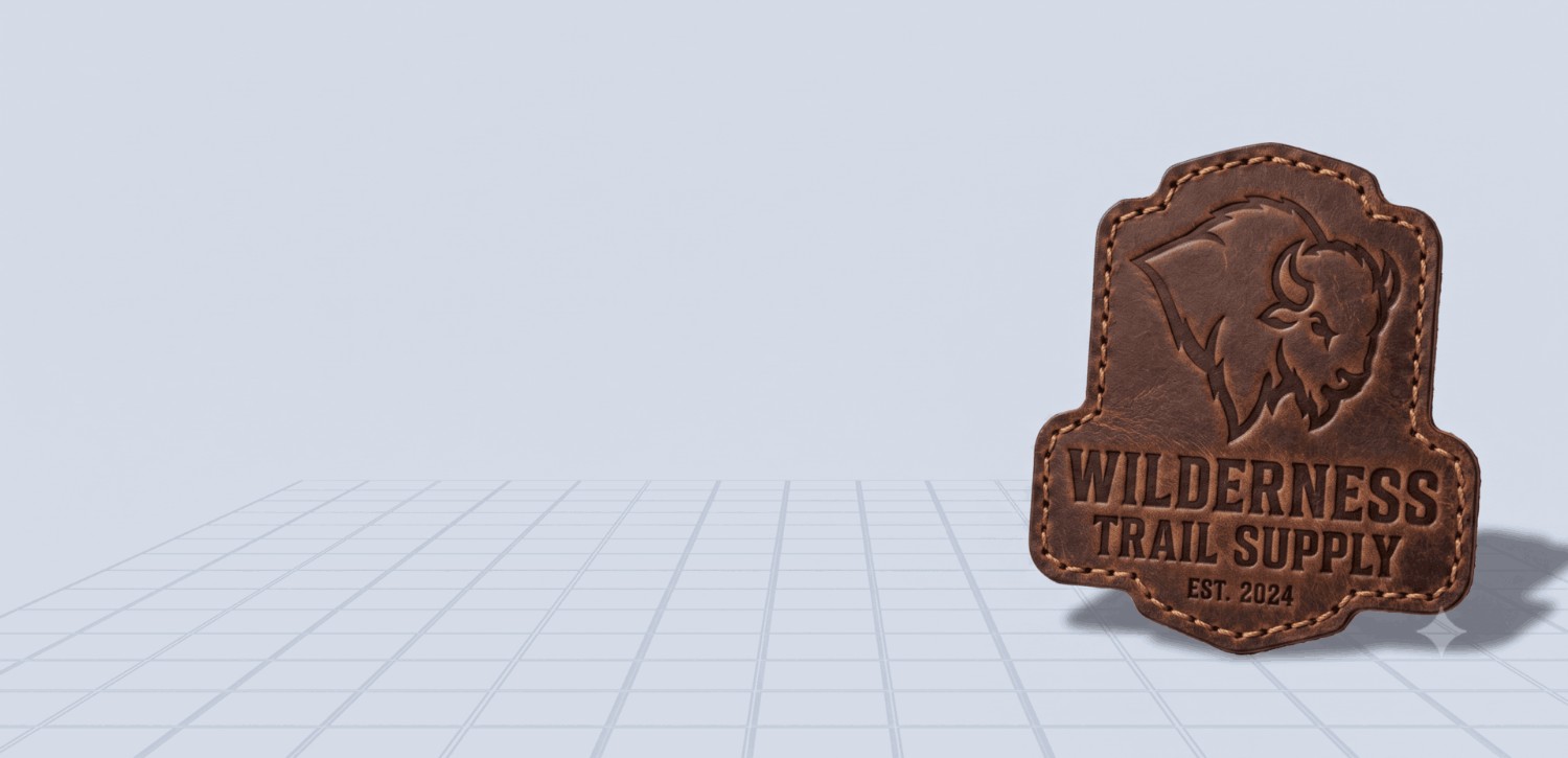 Custom leather patch preview featuring an intricate buffalo head illustration, a shield-shaped die-cut border, and debossed typography reading 
