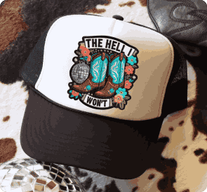 Custom trucker hat mockup displaying a vibrant western-style graphic with a steer skull, cactus, and the text 