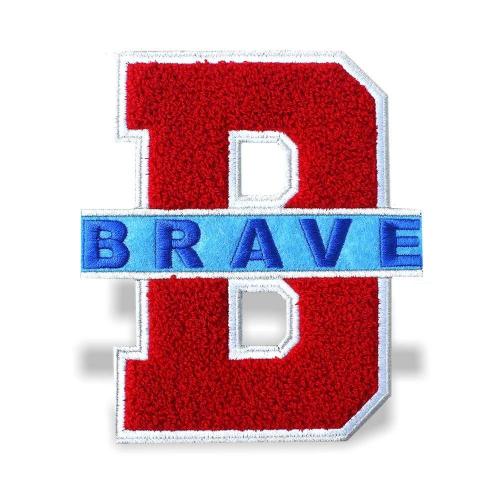 Custom red varsity chenille letter B patch with blue BRAVE overlay